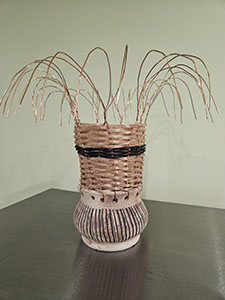 Image of Kurt Priester's clay and metal sculpture, Basket.